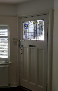 A Charles Rennie MacKintosh inspired stained glass door panel for house in Maidenhead. Berkshire.